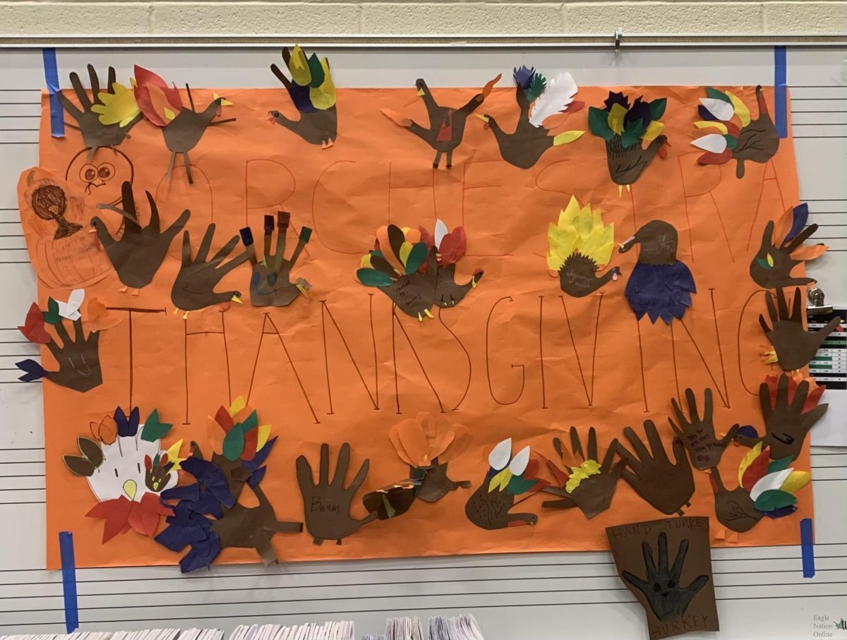 As seen in the photo, hand turkeys made by orchestra students are scattered on a sign that reads "Orchestra Thanksgiving." Prosper Orchestra had a social to celebrate this holiday and what they were grateful for.