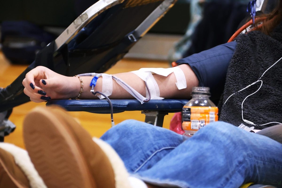 Hooked up to the machine that collects your blood, senior Nicole Rendon waits as her blood is drawn. The blood drive was hosted by HOSA where they partnered with Carter Blood Care. “Honestly, I’ve never (donated blood) before, and I wanted to try it, and plus you get a chord too if you donate twice,” Rendon said. “I was nervous at first, but honestly it wasn’t that bad.”