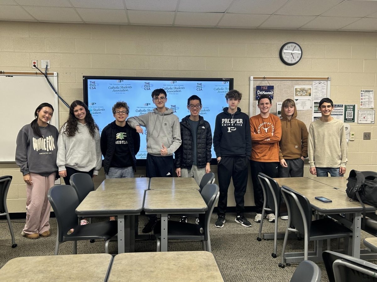 As they finish up their meeting, the Catholic Students Association takes a club picture together. Their meetings are in room 2215 from 4:20 to 5 p.m. "My goal is to spread the word of Jesus, the word of God, throughout our school and especially within our Catholic population," Campos said. "Here, I think a lot of people are Catholic, but they just don't have anything to get involved into."