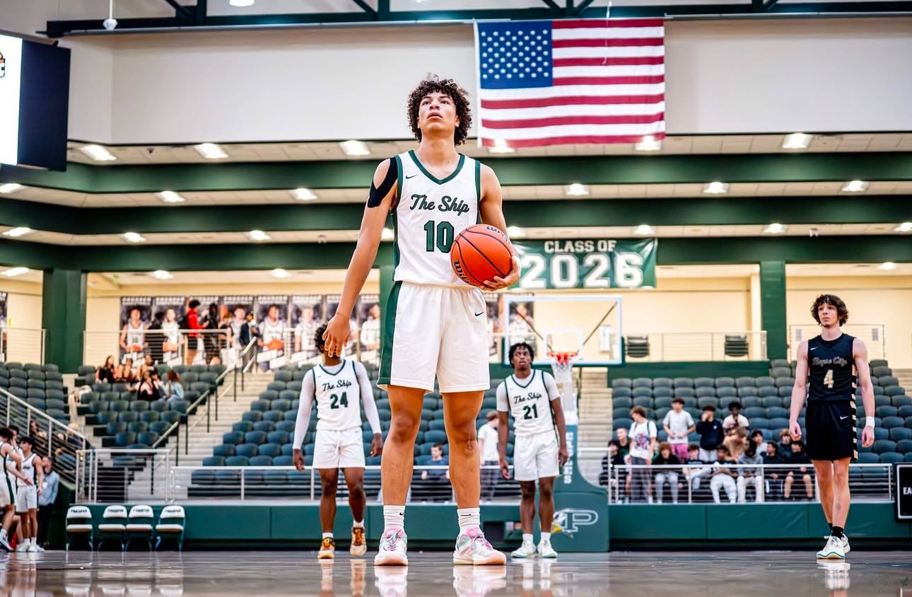 Feet on the free-throw line, junior J'Den Shields gets ready to take a shot. Shields hit 1,000 career points during the teams' game against Frisco Memorial on Nov. 19. In that non-district match-up, Shields contributed 37 points to the Eagles' 85-72 win. 