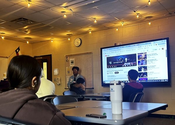 Under the lights, Isaiah Johnson returns to one of Trisha Weyenberg's classes since he graduated in 2017. He lives in Kansas City for his job and travels around the country to speak in classrooms. "Don't listen to people, because you can make money and be happy," Romeo said. "And, I could be an example of that. I do what I love." Another seperate article is coming out on Isaiah soon.