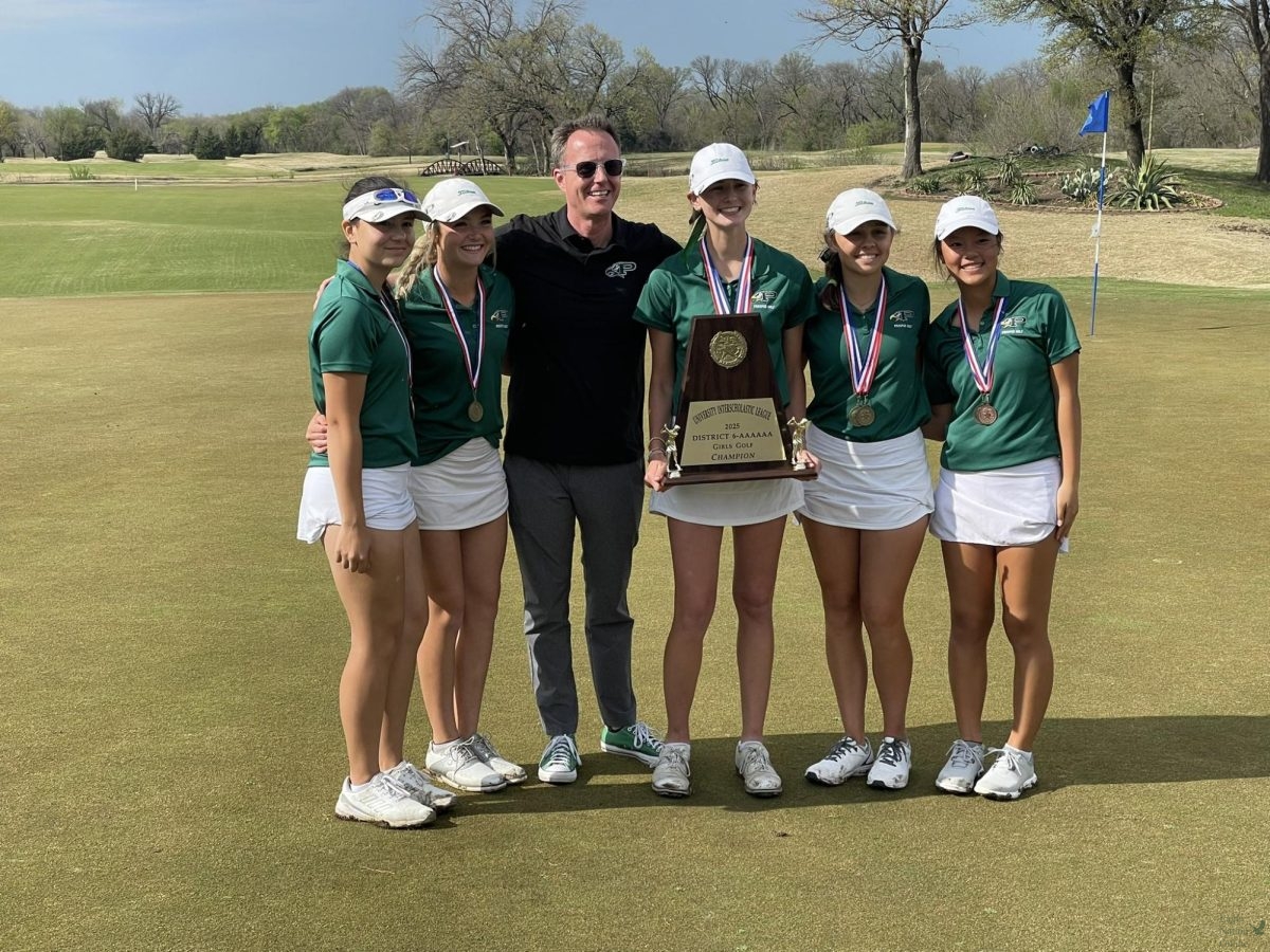 As senior Kendall Simms holds the girls golf team's first place district plaque, senior Sophia Duque, sophomore London Pearson, Principal Nick Jones, sophomore Tatum Churchman and junior Erica Lee come together. The team will compete at the Golf Regionals Tournament in April. "It was a very intense day," golf coach Tyler Pearson said. "The girls handled the emotions and pressure unbelievably well."