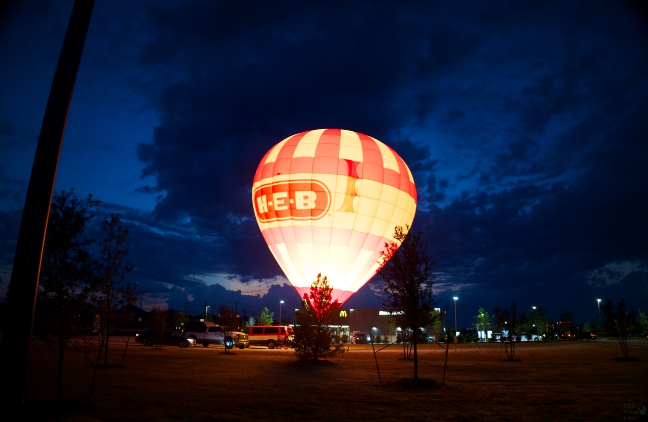 Illuminated from the distance, a H-E-B hot air balloon can be seen.  Prosper's H-E-B officially opened at 6 a.m. This location is the 11th store in the DFW area.
