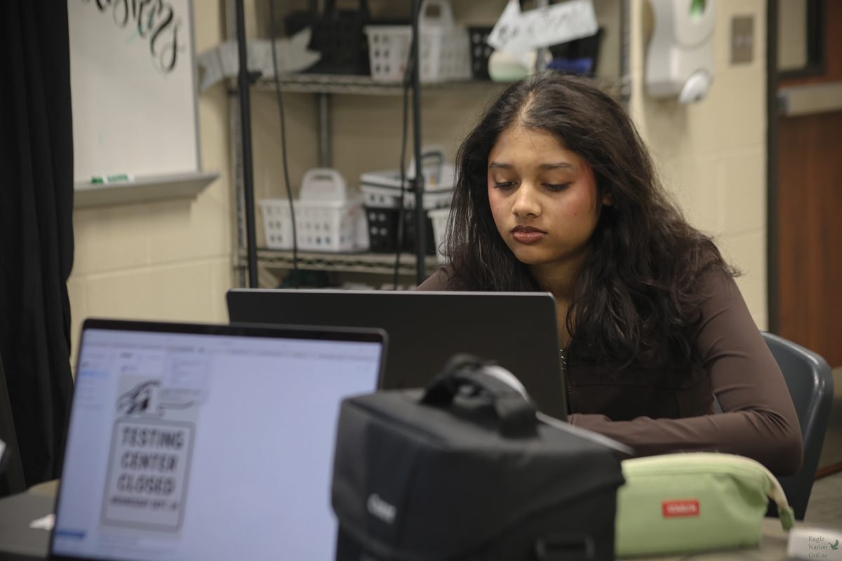 Sitting at her desk, senior and reporter Srinitha Arikati works on one of her publications. This is Arikati's first year on the ENO staff. “My favorite part (about ENO) is that we publish stories every day, and it just means that every day is a new day to learn about the school,” Arikati said. “There are so many different clubs and activities I never knew about before until I started publishing for ENO, and I started reading them and learning about them.”
