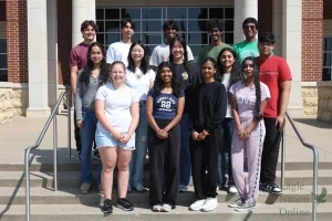 PHS's National Merit Semifinalists stand in front of the PHS building. Adithri Raghuram, Arnav Bhute, Dylan Lyon, Emily Zhang, Janani Sridhar, Katie Lee, Kenna Boyd, Khyati Khanderao, Krish Hariharan, Lakshya Meiyappan, Meher Lahiri Gudipati, Murtaza Siddiqui, Om Gaddad and Tejas Paleti qualified for the Semifinalists due to their substantial scores during the PSAT/NMSQT test and are on their way to become finalists. "I believe we find out [the finalists] in February,” senior Meher Lahiri Gudipati said. “So I guess we're just looking forward to it."