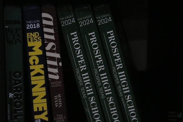 Resting on the shelf, the 2024-2025 yearbook is shown. It costs $90 to buy the yearbook this year. "The yearbook this year is going to be 320 pages," Potter said. "The yearbook will be finished in February."