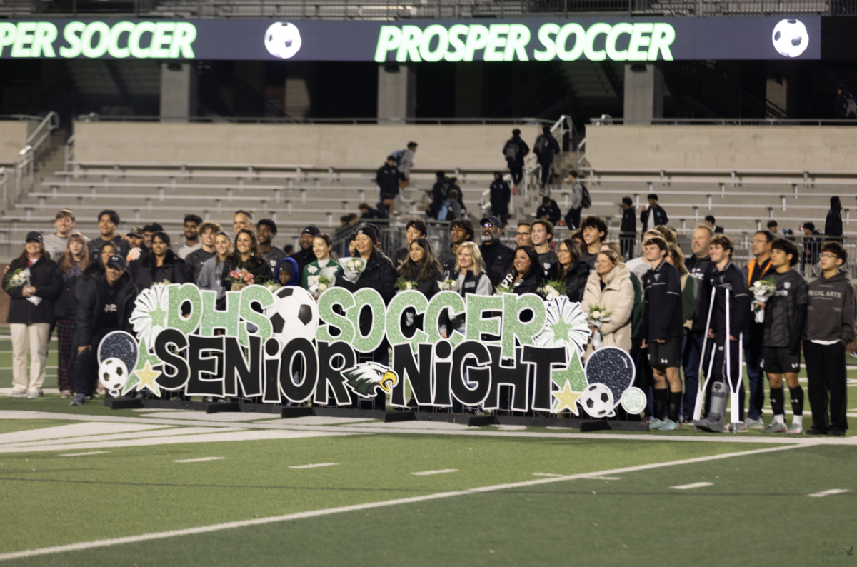 Before kickoff on Thursday, Jan. 22, the soccer team held a senior night recognition. Senior players were acknowledged for their time with the program. They gathered on the field for a group photo as part of the pregame ceremony. 