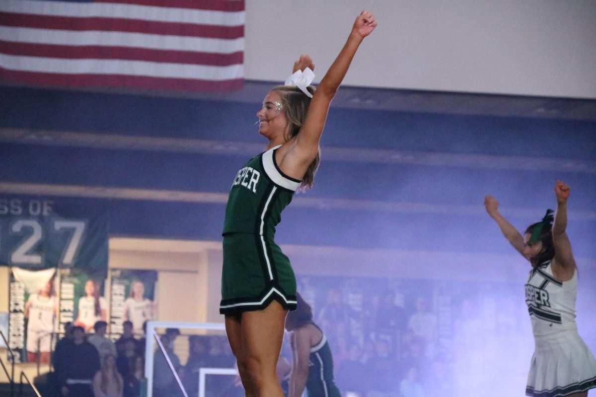 Fists in the air, sophomore Ayden Holman showcases her stunt. It was announced that Holman was a JV Game Girl of the Week on Oct. 25, 2025. Along with being on the cheer team, Holman participates in powerlifting, placing fourth in her latest meet two weeks ago.