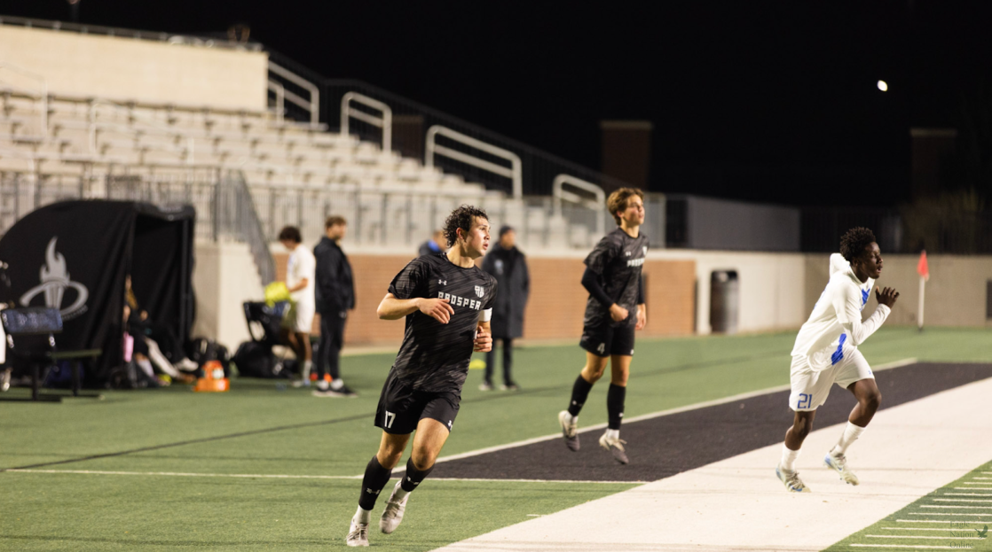 Running down the field, senior Anthony Yarrobino heads toward the goal. Yarrobino has been a part of the Prosper soccer program for four years. This is Yarrobino's first year as varsity captain. 