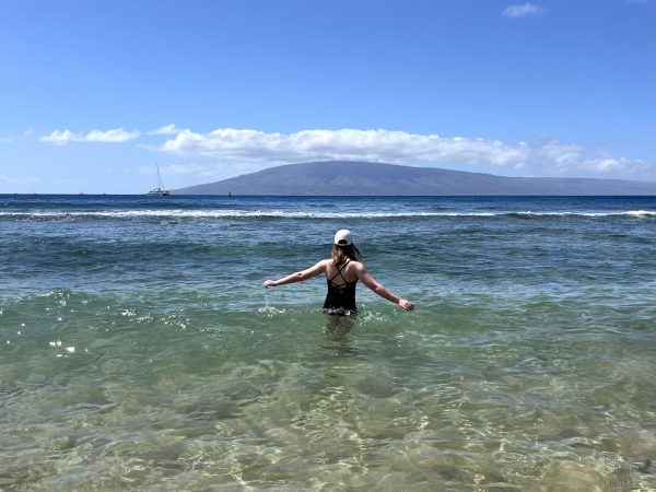 Arms open, sophomore Polly Greaves stands in the ocean of Maui, Hawaii. She visited her grandma on a girls' trip with her mom and attended a luau. “The best part was the whales,” Greaves said. “From the beach, you could see them breaching. It was magical.”