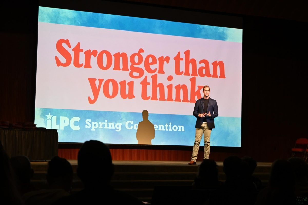 Addressing the crowd, NBC Correspondent Morgan Chesky speaks about his experience reporting during the Guadalupe River floods. "You can't be scared to stand in the mud of a big story and tell the truth, even if it breaks your heart," Chesky said. "You don't need me, or a poster or anyone else in this world to tell you that you are indeed. Stronger than you think."