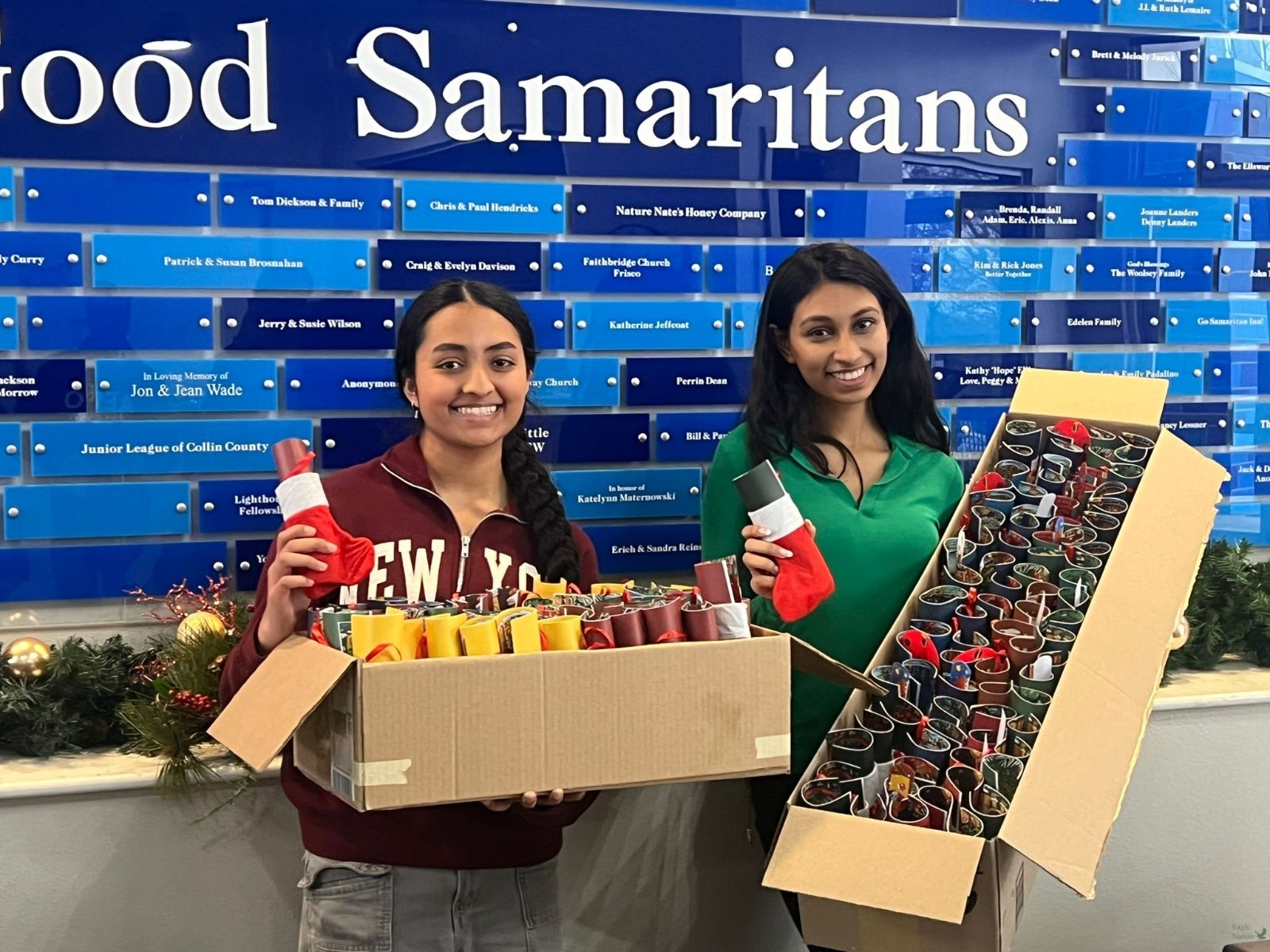 Smiling at the camera, seniors Adithri Raghuram and Riti Patel hold boxes filled with peppermints, coloring books toys to distribute to students later. Supplying Smiles has reached over 20 states and their schools. "We chose to address educational inequity through these means as school materials are accessible, meaning with fundraised money, we can easily purchase them," Raghuram said. "I love watching people’s faces light up and seeing that our impact makes a difference."