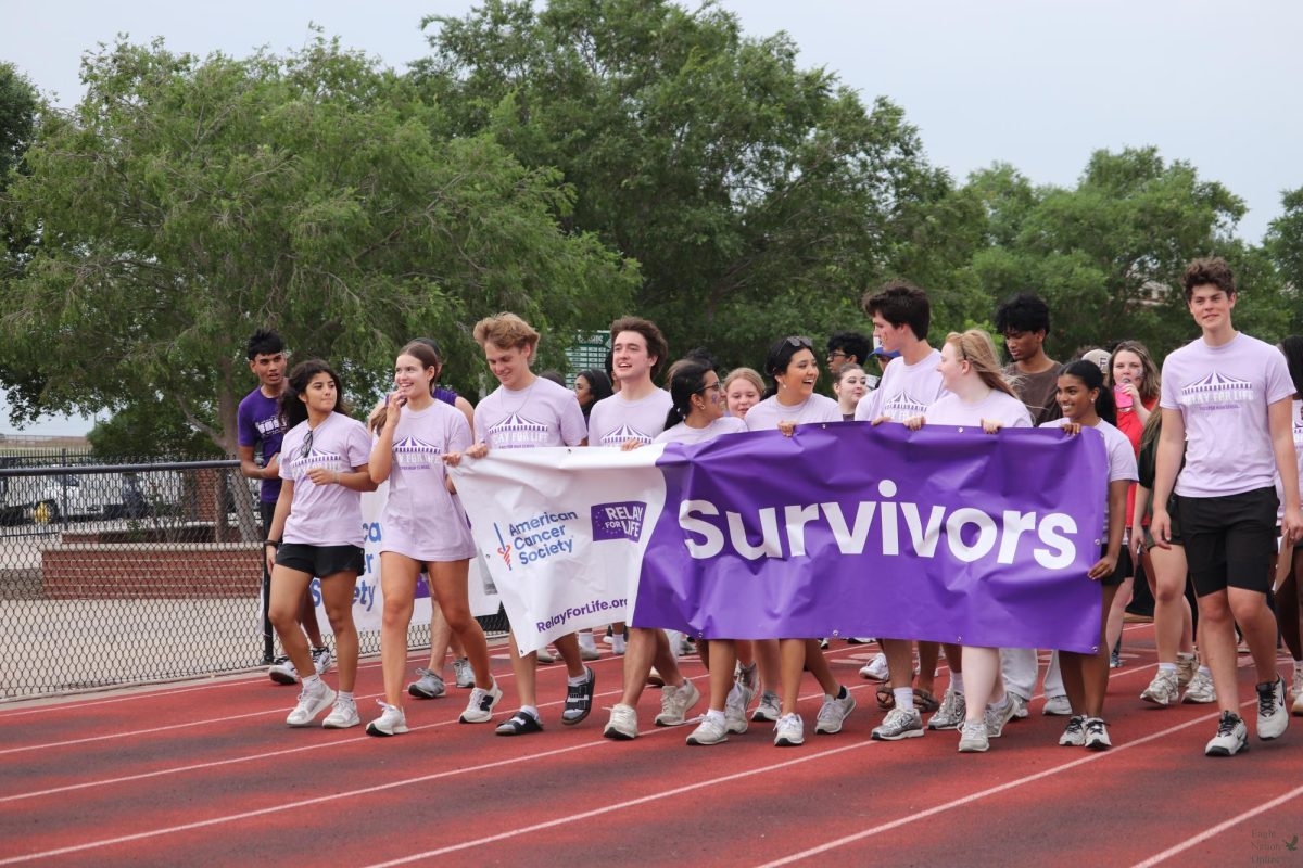 Walking the track, student council officers lead the "Survivors Walk." Prosper High School hosts the Relay for Life fundraiser annually during the month of April. Over 10 clubs host stalls with fun activities for attendees. 
