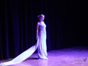 Looking straight ahead, Presley Christensen performs her part. Christensen plays 'Elsa' from 'Frozen' in the Disney Reality Show. The play opened on Feb. 18.